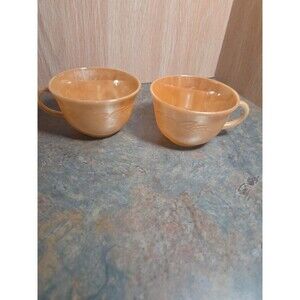 Two Vintage Fire King Peach Luster Tea Cups USA Laurel Leaf Three Bands 1960s